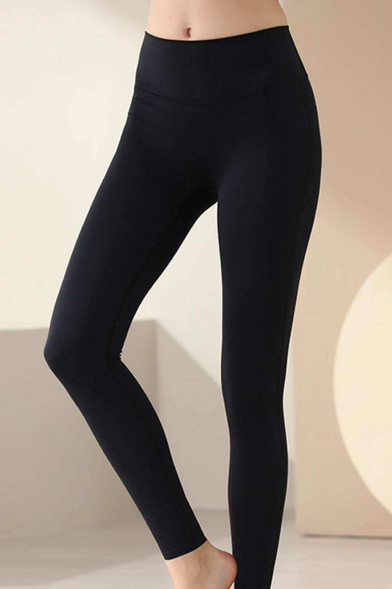 Leggings deportivos largos de corte slim con cintura ancha