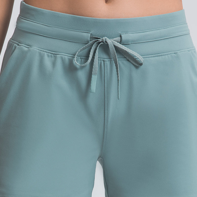 Pantalones cortos activos con lazo en la cintura