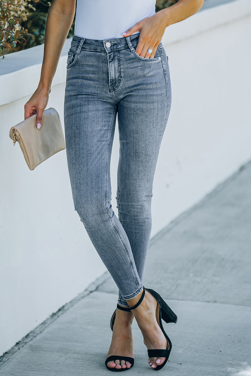 Jeans ajustados al tobillo con bolsillos