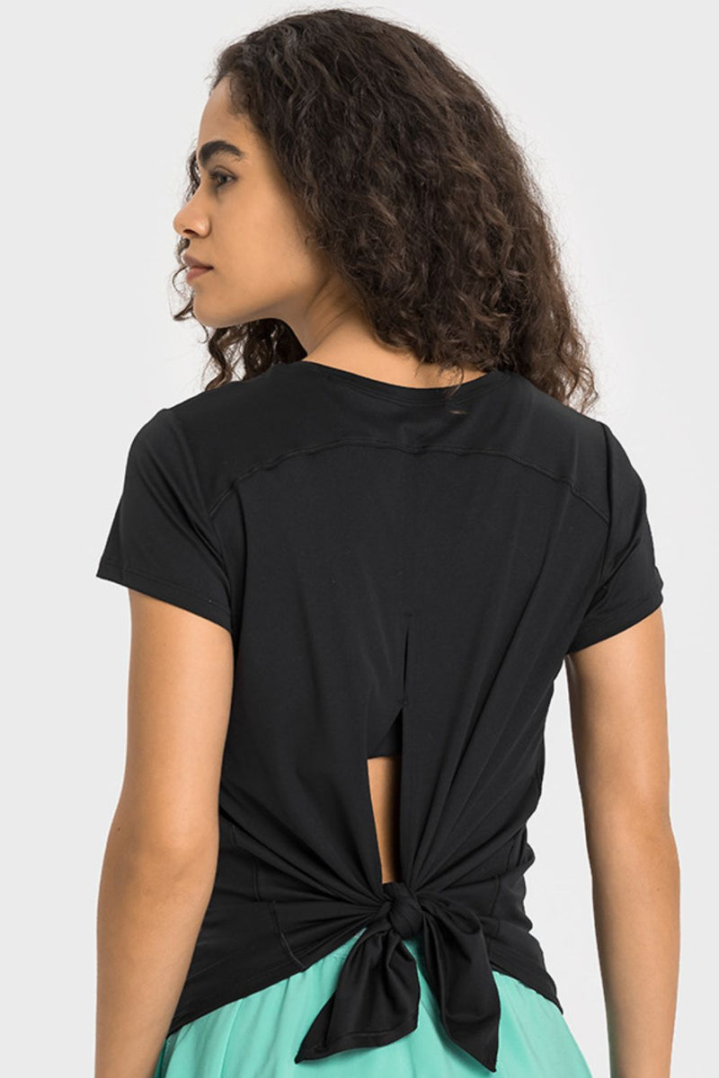 T-shirt de sport à manches courtes et lien au dos